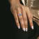7-7.5MM Black Freshwater Cultured Pearl and White Topaz Halo Ring in
Sterling Silver