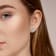 3 1/6 CT TGW Sky Blue Topaz and 1/6 CT TDW Diamond Halo Earrings in
Yellow Plated Sterling Silver