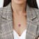 8 3/8 CT TGW Pink Topaz and White Sapphire Halo Pendant with Chain in
Yellow Plated Sterling Silver