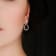 2 1/5 CT DEW Created Moissanite Open Teardrop Dangle Earrings in
Sterling Silver