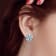 5 1/8 CT TDW London Blue Topaz and White Topaz Earrings with Omega Clip
Closure in Sterling Silver