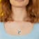 7-9MM Freshwater Cultured Pearl and 2 3/4 CT TGW Topaz and Sapphire
Pendant in Sterling Silver