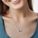 9.5-10MM  Freshwater Cultured Pearl and 1/6 CT TGW Created Sapphire
Pendant in Sterling Silver
