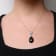 18K White Gold Pear Cut Blue Topaz and Black Onyx Gemstone with Diamond
Accent Dangle Drop Pendant