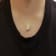 14K Yellow Gold 1 1/2 cttw Princess and Baguette Cut Diamond Geometric
Pendant Necklace