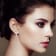 Sterling Silver 1/4ctw Prong Set Round-Cut Diamond Twist and Swirl Hoop Earring