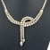 14K Yellow Gold 17.0ctw Diamond Double Row Lariat Tennis Necklace with
Pear Shape Diamond Drop Tips