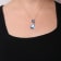 18K White Gold Pear Cut Blue Topaz and Round Blue Topaz with Diamond
Accent Dangle Drop Pendant