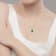 10k Yellow Gold Oval Emerald and Diamond Twist Pendant With Chain