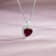 J'ADMIRE Garnet Simulant Platinum Over Sterling Silver Heart Pendant
with Chain