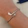 Sterling Silver Golf Club and Ball Bangle Bracelet with Crystal Accents.