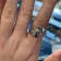 Sterling Silver Bonefish Ring with Blue CZ Accent.
