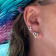 Sterling Silver Fishing Hook Heart Shape Stud Earrings with Blue CZ Accents.