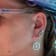 Sterling Silver Compass Dangle Earrings with Blue CZ Accents.
