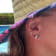 Sterling Silver Propeller Stud Earrings with Blue CZ Accents.