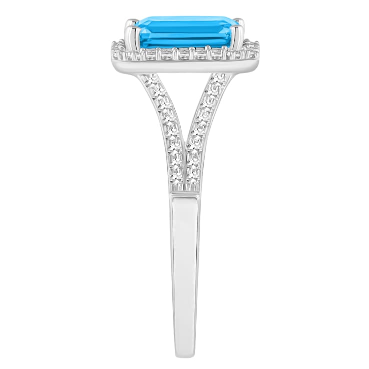 8x6mm Emerald Cut Blue Topaz 1/4 ctw Diamond Rhodium Over Sterling
Silver Halo Ring