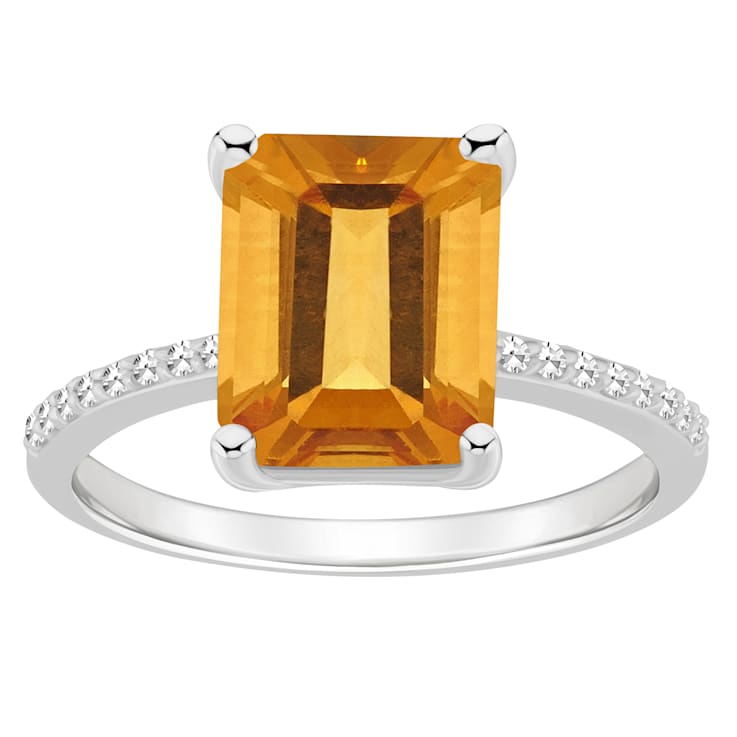 10x8mm Emerald Cut Citrine and 1/10 ctw Diamond Rhodium Over Sterling
Silver Ring
