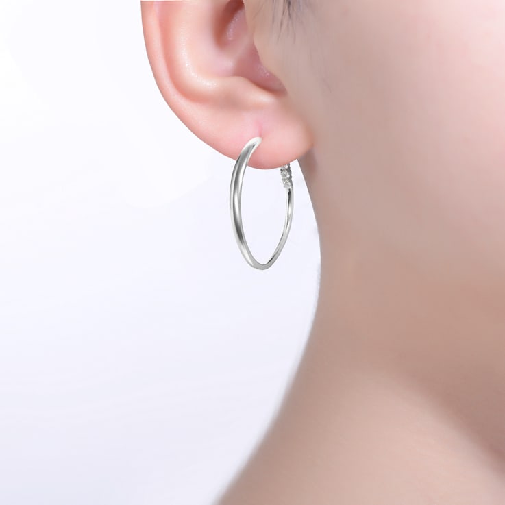 Clear Cubic Zirconia, Rhodium Over Sterling Silver with 3-Stone C-Hoop
Earrings 0.28ctw
