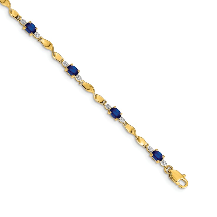 14k Yellow Gold and Rhodium Over 14k Yellow Gold Diamond and Oval
Sapphire Bracelet