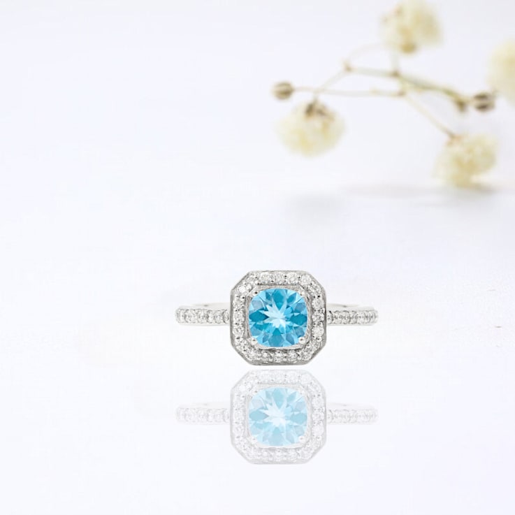 Lab Grown Diamond and Paraiba Blue Apatite Rhodium Over Sterling Silver
Cushion Cut Halo Ring