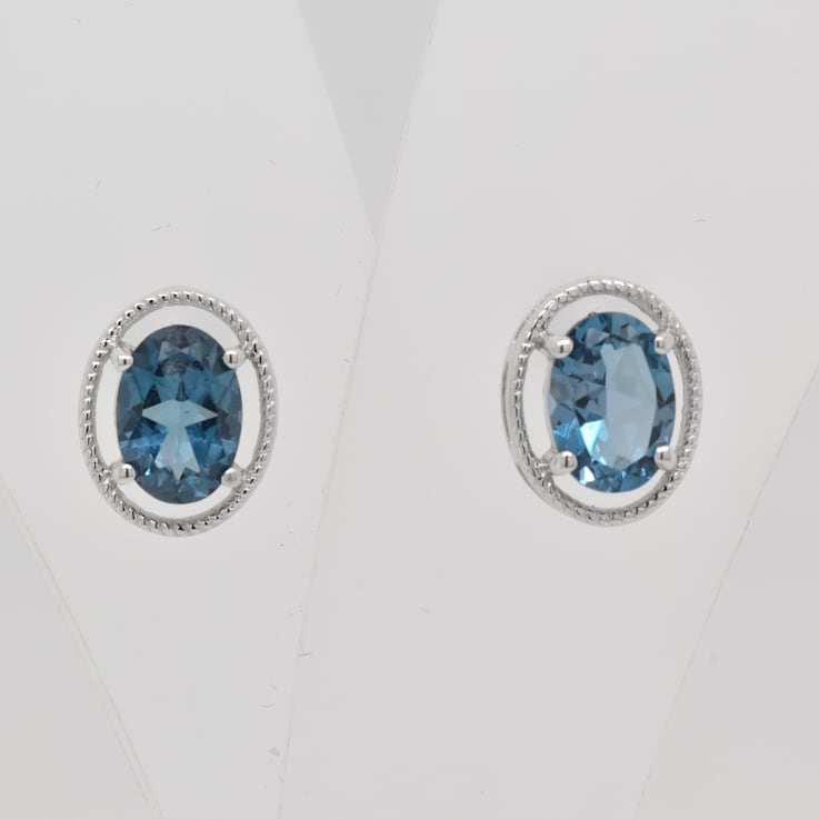 1.74ctw Oval London Blue Topaz Rhodium Over Sterling Silver Stud Earrings