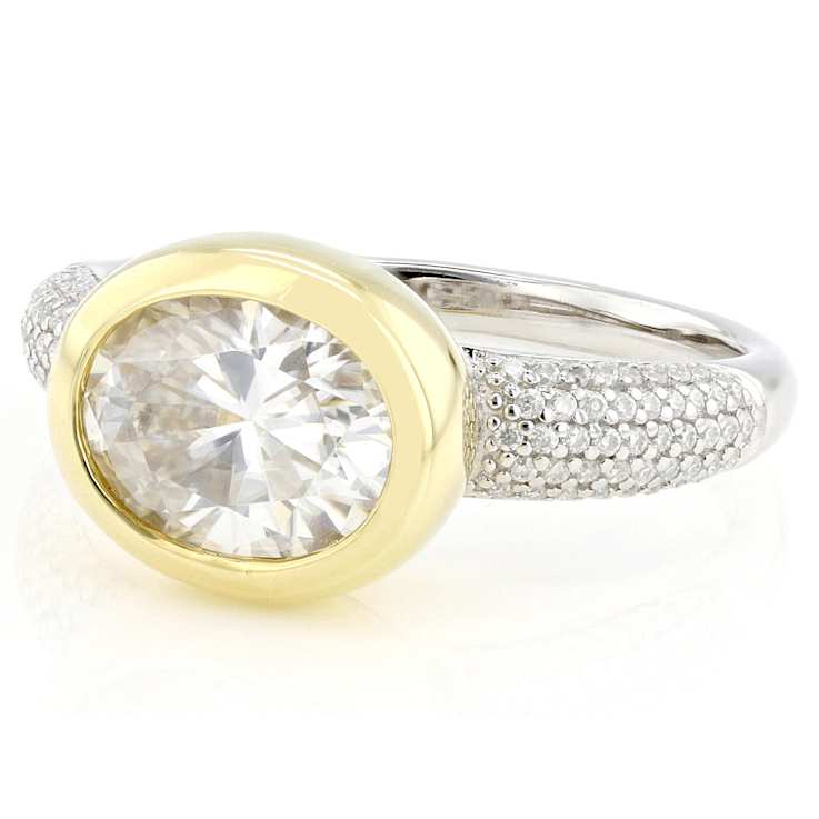 Bezel Set Two-Tone Moissanite Ring In Sterling Silver With 14K Gold Over
Silver Accent