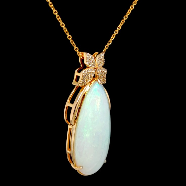Ethiopian Opal Pear Shape Cabochon and Round Diamond 14K Yellow Gold
Pendant with Chain, 14.38ctw