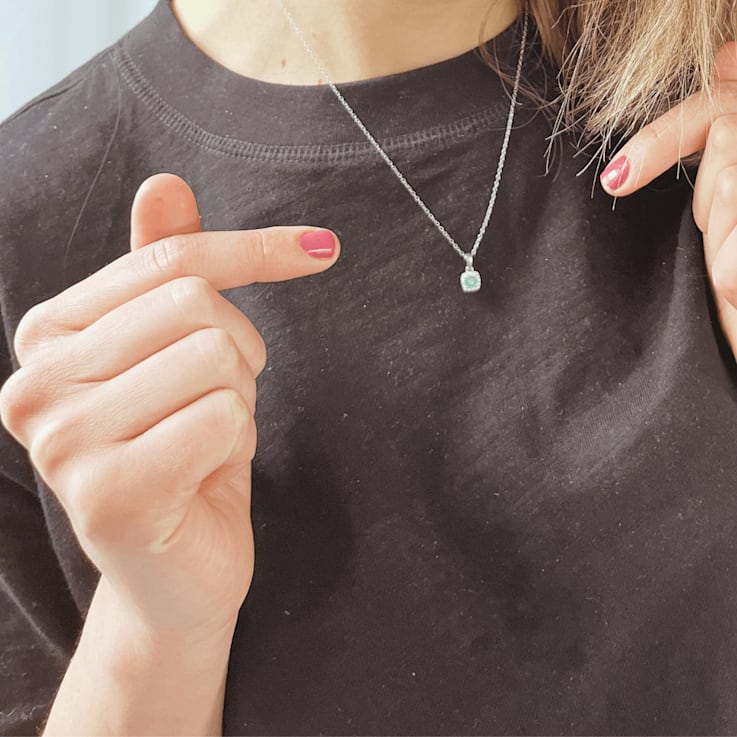Emerald and Moissanite Sterling Silver Halo Style Pendant With Chain