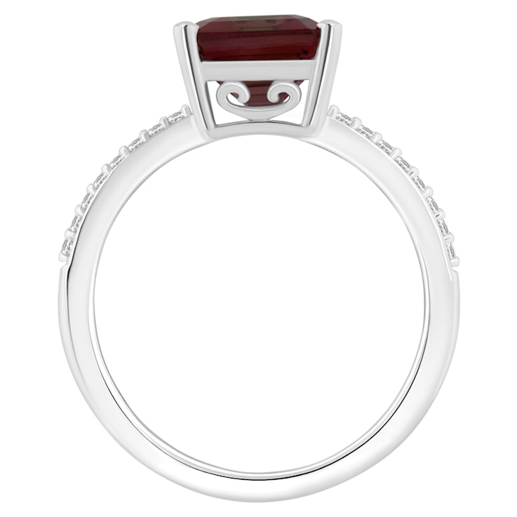 10x8mm Emerald Cut Garnet and 1/10 ctw Diamond Rhodium Over Sterling
Silver Ring