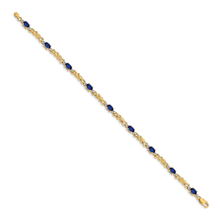 14k Yellow Gold and Rhodium Over 14k Yellow Gold Diamond and Oval
Sapphire Bracelet