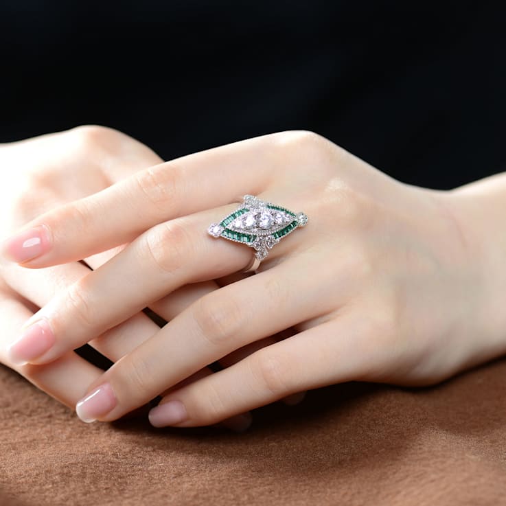 Rhodium Plated over Sterling Silver with Green Color Cubic Zirconia
Modern Ring