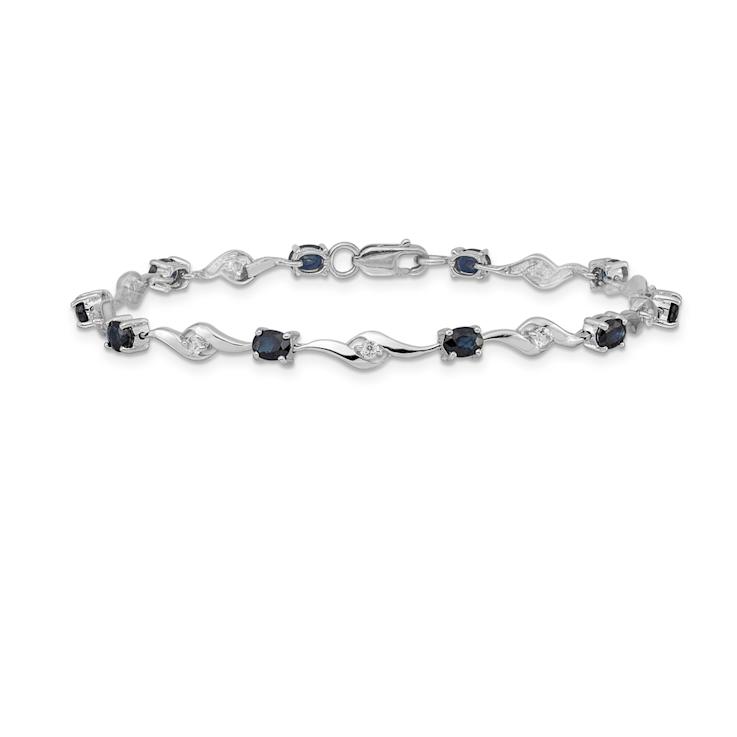 Rhodium Over 10k White Gold Oval Shaped Blue and Round Shaped White
Sapphire Bracelet