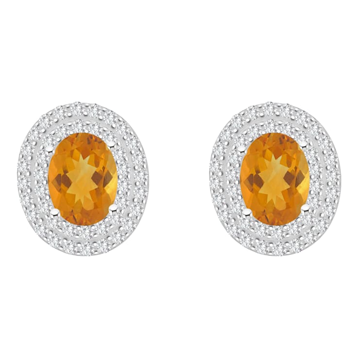 8x6mm Oval Citrine And White Topaz Accent Rhodium Over Sterling Silver
Double Halo Stud Earrings