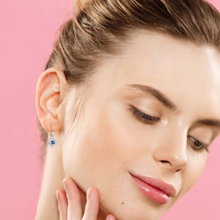 2.63ctw London Blue, Sky Blue and White Topaz Cluster Earrings in
Sterling Silver