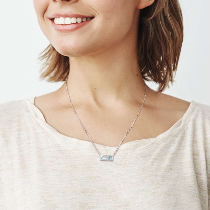 3ctw Sky-Blue Topaz and White Sapphire Halo Necklace in Sterling Silver