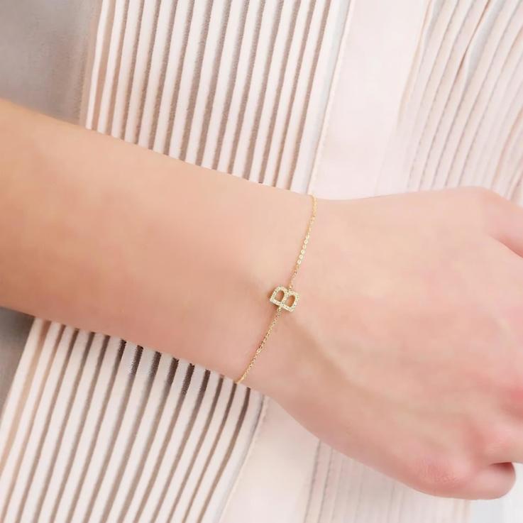 10K Yellow Gold White Diamond V Initial Bracelet for Women with
Adjustable Chain, 0.05ctw