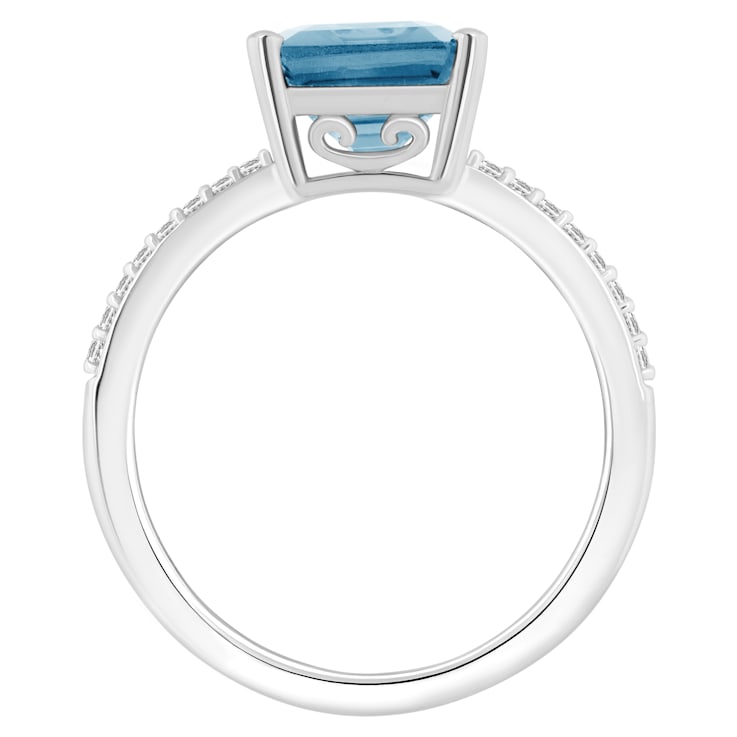 10x8mm Emerald Cut Sky Blue Topaz and 1/10 ctw Diamond Rhodium Over
Sterling Silver Ring