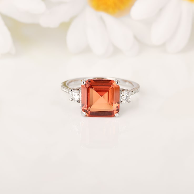Peach Orange Lab Created Padparadscha Sapphire Rhodium Over Sterling
Silver Three Stone Octagon Ring