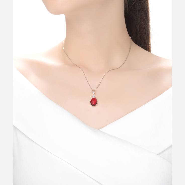 Ruby Color CZ Teardrop Pendant In 18K Rose Gold Over Sterling Silver