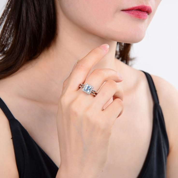 Blue Topaz with White Topaz Accents Sterling Silver Halo with Split
Shank Ring