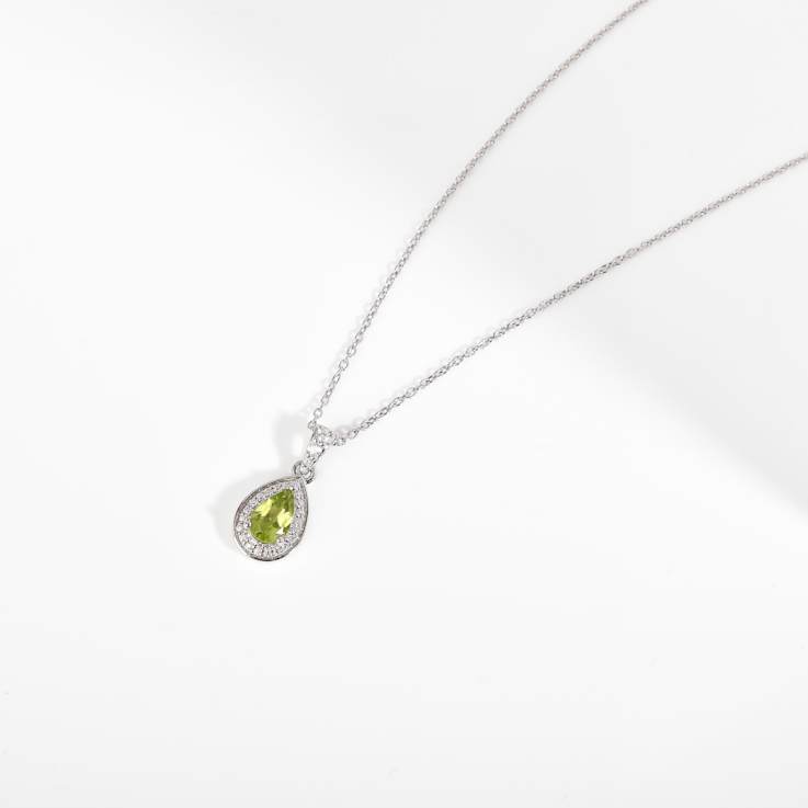 Pear Shape Peridot with Moissanite Accents Rhodium Over Sterling Silver
Pendant with Chain