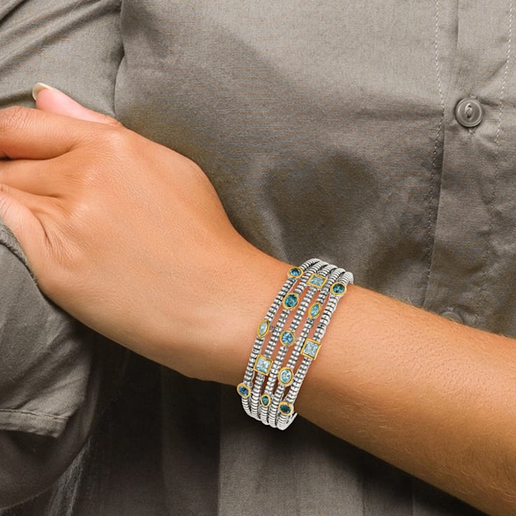 Sterling Silver with 14K Yellow Gold Sky Blue, Swiss Blue, and London
Blue Topaz Cuff Bracelet