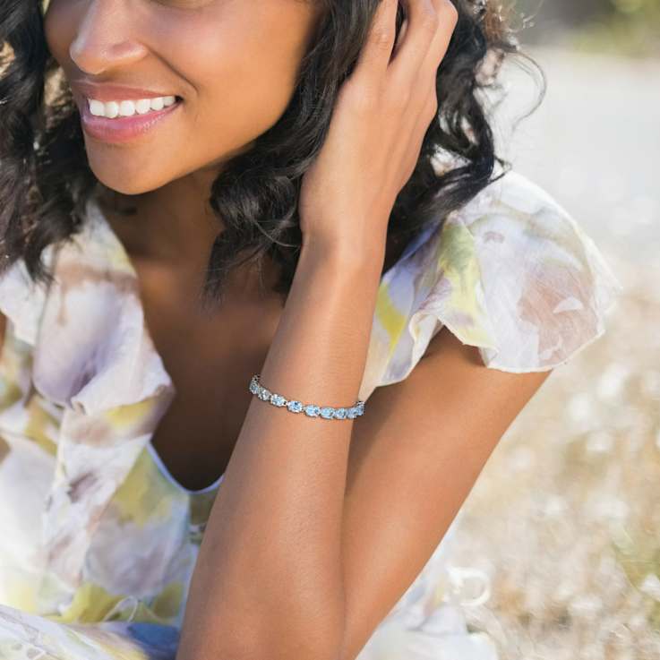 28.50ctw Oval-Cut Sky-Blue Topaz Tennis Bracelet in Rhodium Over
Sterling Silver