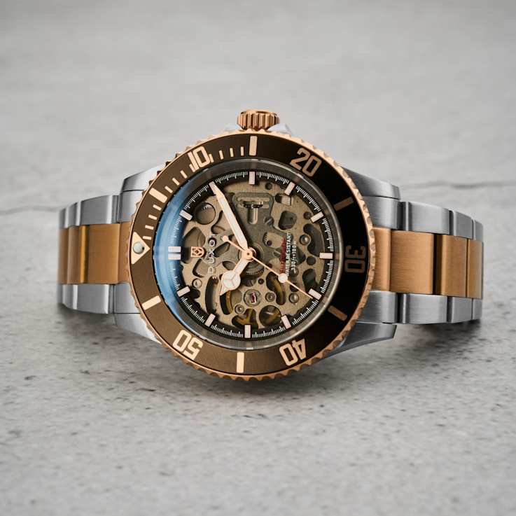 Duxot Atlantica Skeleton Diver Brown Dial Rose Bezel Two-tone Stainless
Steel Band Automatic Watch