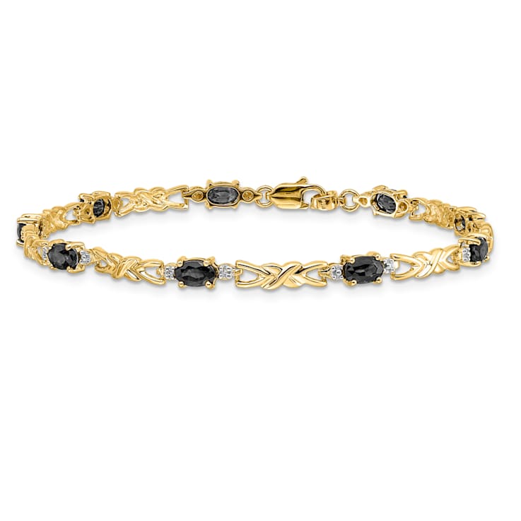 14k Yellow Gold and Rhodium Over 14k Yellow Gold Diamond and Oval
Sapphire Bracelet