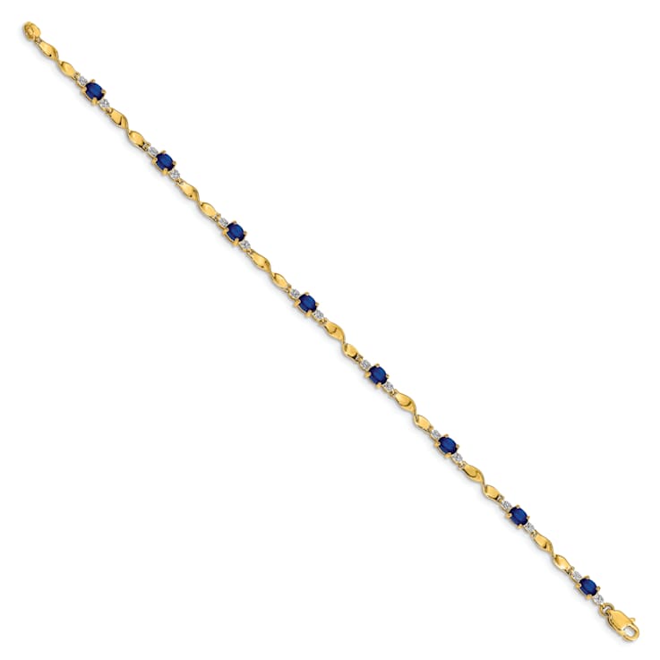 14k Yellow Gold and Rhodium Over 14k Yellow Gold Diamond and Oval
Sapphire Bracelet