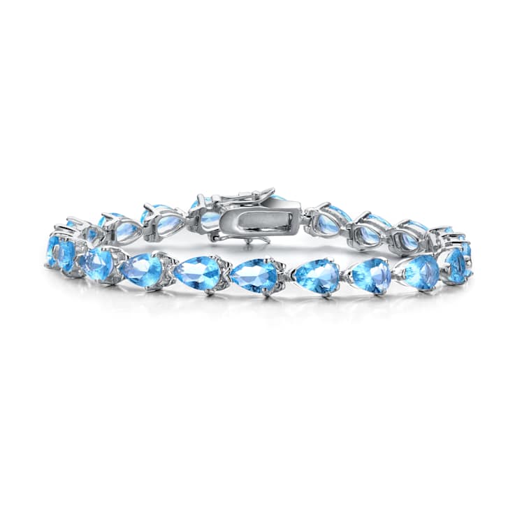 Blue Topaz Color CZ Pear Shape Tennis Bracelet In White Rhodium Over Brass