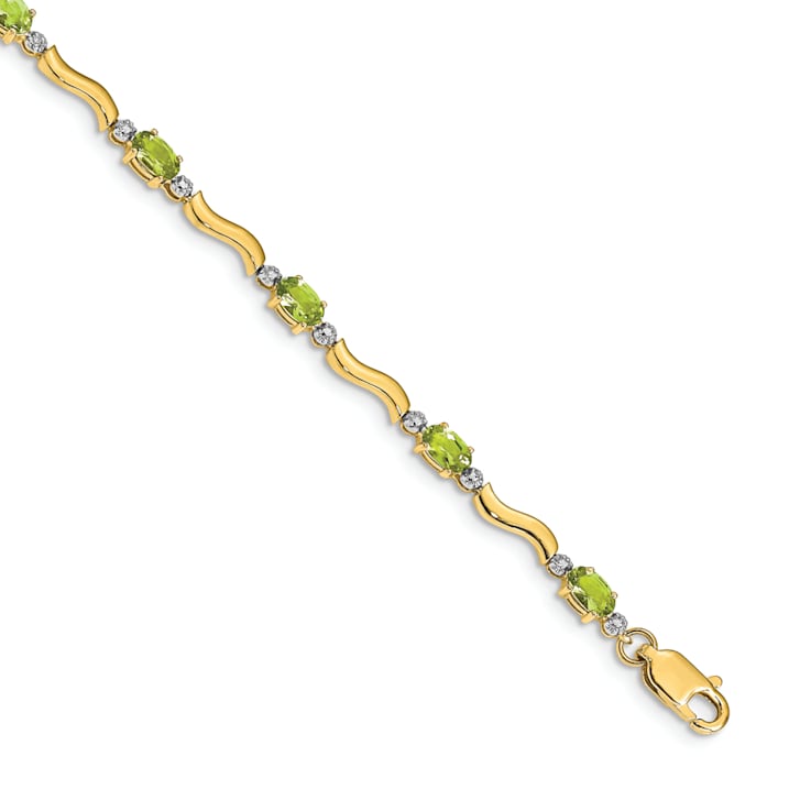 14k Yellow Gold and Rhodium Over 14k Yellow Gold Fancy Diamond and
Peridot Bracelet