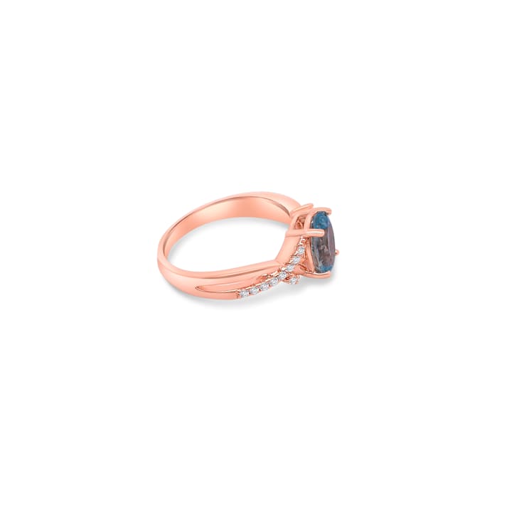 9x7mm Oval Aquamarine and White CZ 18K Rose Gold Over Sterling Silver
Ring, 1.54ctw
