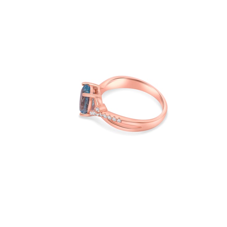 9x7mm Oval Aquamarine and White CZ 18K Rose Gold Over Sterling Silver
Ring, 1.54ctw